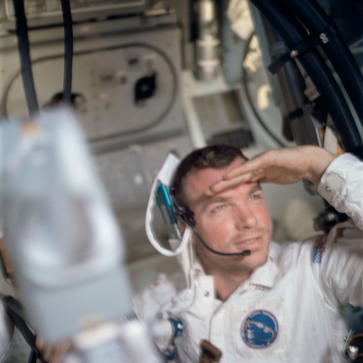 Astronaut in main cabin of Apollo 9 Command Module