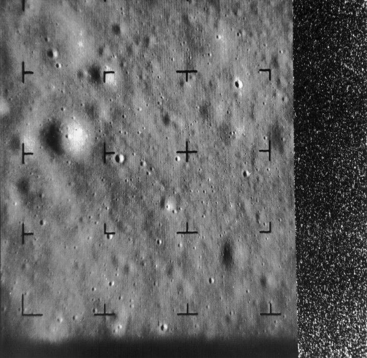 Image of the surface of the Moon, showing blurry craters. 