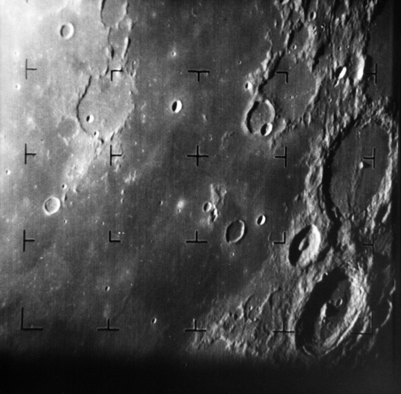 Black and white image of craters on the Moon.