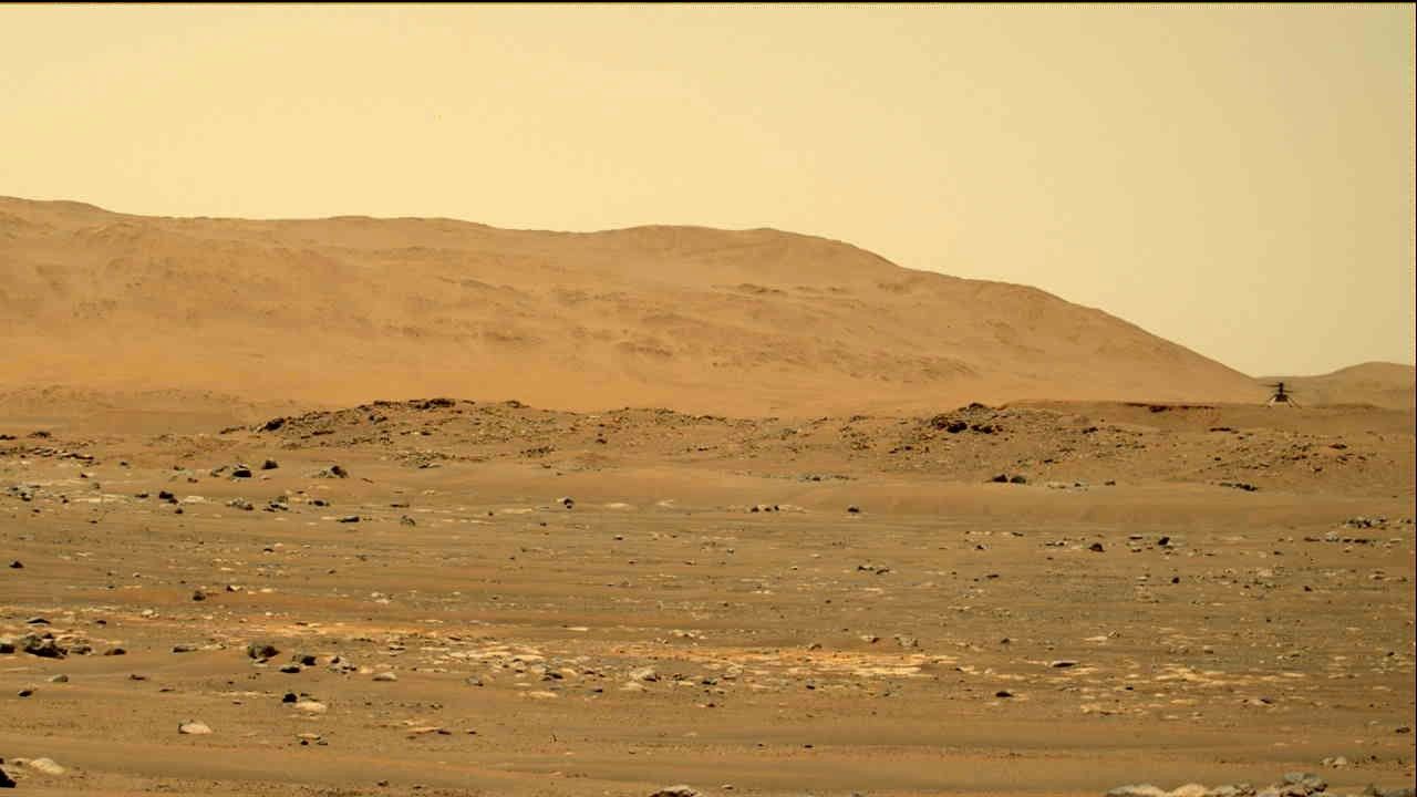 NASA’s Mars Perseverance rover acquired this image of the Ingenuity Mars Helicopter (upper right) using its left Mastcam-Z camera.