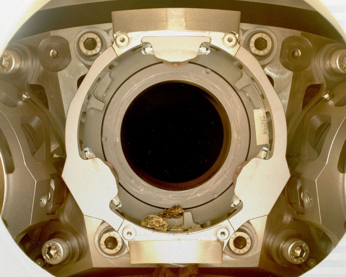 Pebble-sized debris can be seen in the bit carousel of NASA’s Perseverance Mars rover in this Jan. 7, 2022, image.