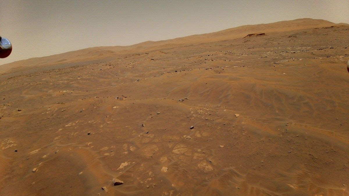 This image of Mars was taken from the height of 33 feet (10 meters) by NASA’s Ingenuity Mars helicopter during its sixth flight on May 22, 2021.