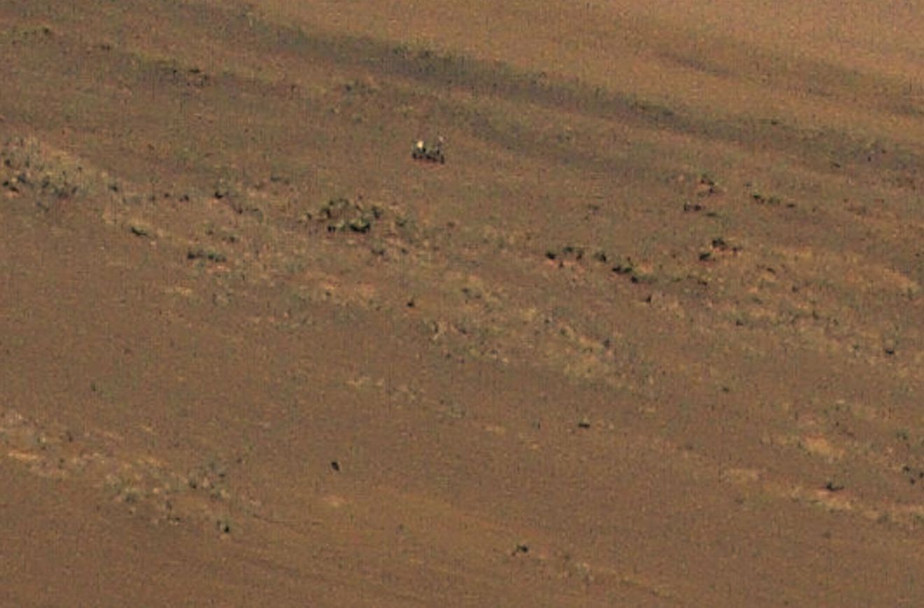 Ingenuity captured the Perseverance rover in an image taken during its 11th flight at Mars on Aug. 4.