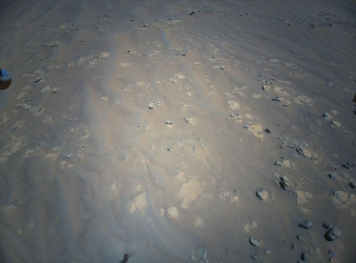 The Return to Earth camera on NASA’s Ingenuity Mars Helicopter snaped this picture of geologic feature the Mars Perseverance rover team calls “Raised Ridges” during its 10th flight at Mars, on July 24, 2021.