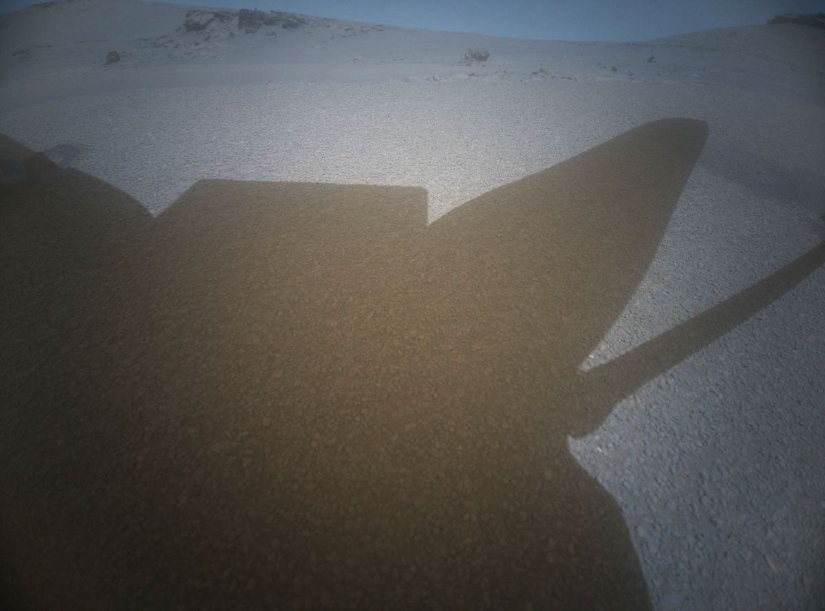 NASA's Ingenuity Mars Helicopter acquired this image using its high-resolution color camera. This camera is mounted in the helicopter's fuselage and pointed approximately 22 degrees below the horizon.