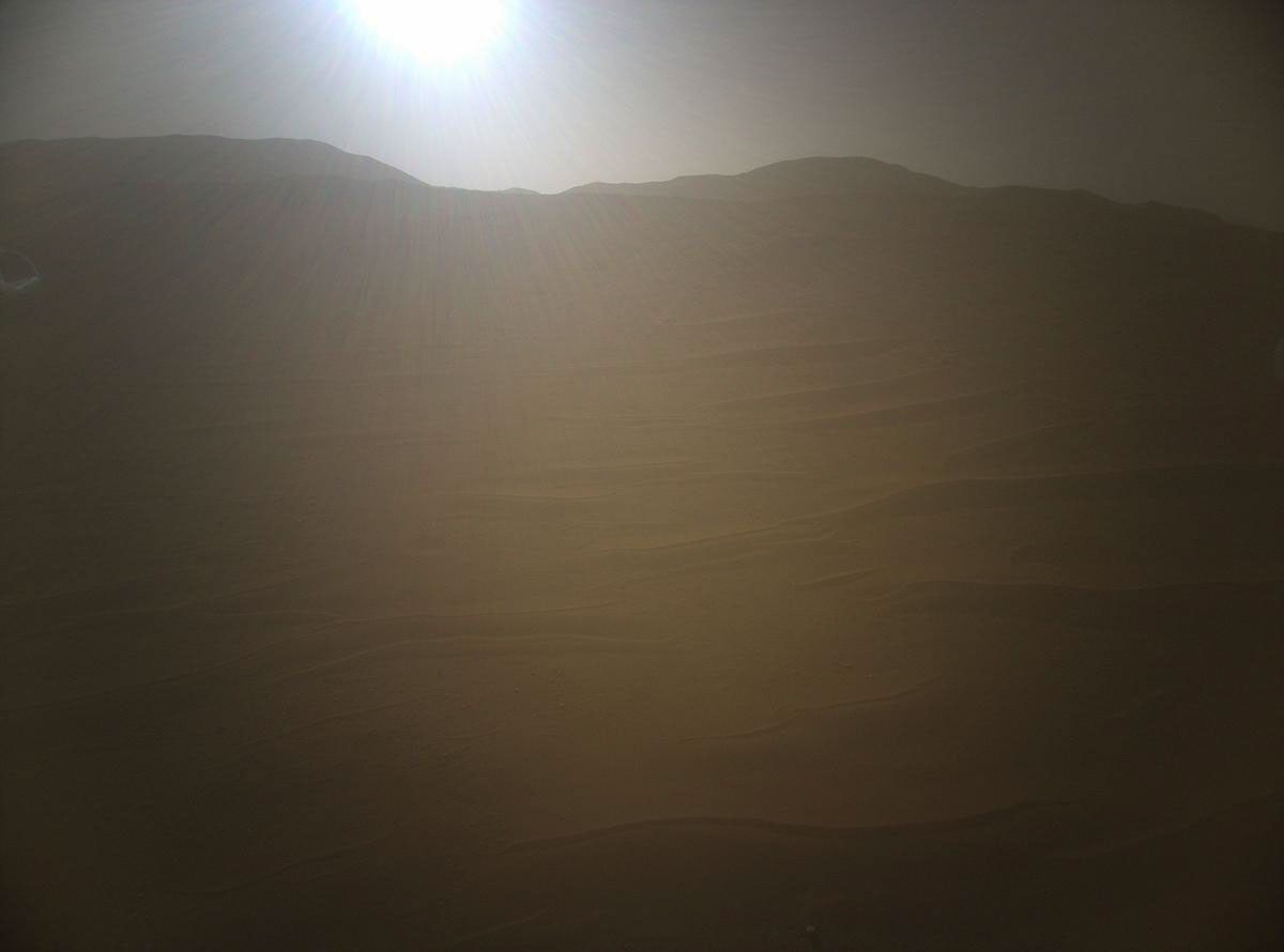 NASA's Ingenuity Mars Helicopter acquired this image using its high-resolution color camera. This camera is mounted in the helicopter's fuselage and pointed approximately 22 degrees below the horizon.