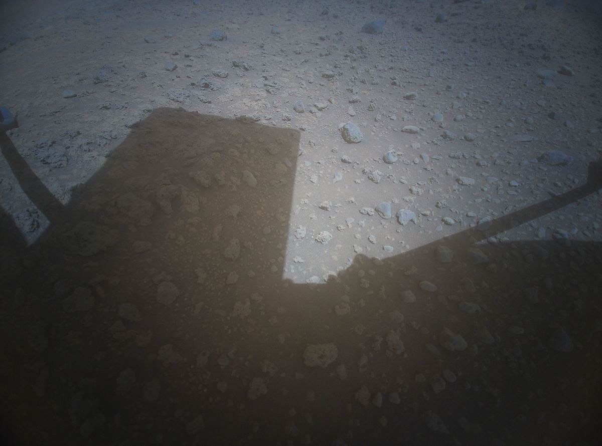 NASA's Ingenuity Mars Helicopter acquired this image using its high-resolution color camera. This camera is mounted in the helicopter's fuselage and pointed approximately 22 degrees below the horizon.