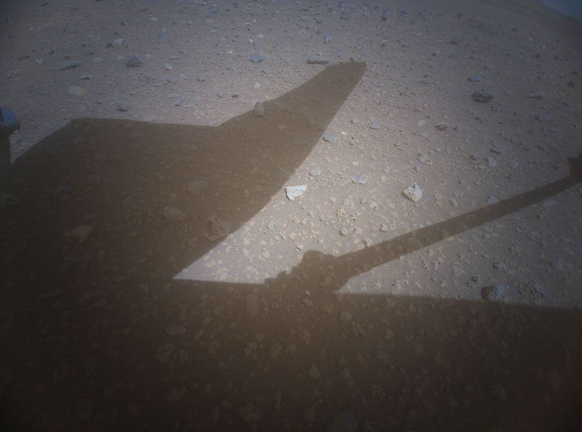 NASA's Ingenuity Mars Helicopter acquired this image using its high-resolution color camera. This camera is mounted in the helicopter's fuselage and pointed approximately 22 degrees below the horizon.