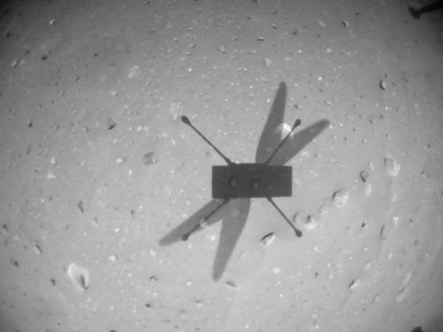 NASA's Ingenuity Mars Helicopter acquired this image using its navigation camera. This camera is mounted in the helicopter's fuselage and pointed directly downward to track the ground during flight.