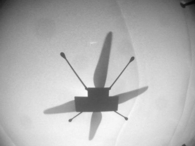 NASA's Ingenuity Mars Helicopter acquired this image using its high-resolution color camera. This camera is mounted in the helicopter's fuselage and pointed approximately 22 degrees below the horizon.