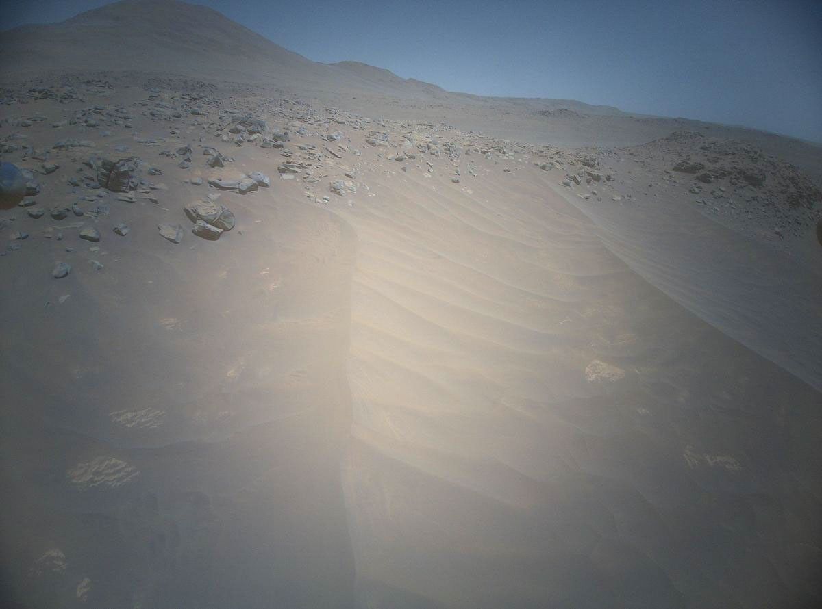 NASA's Ingenuity Mars Helicopter acquired this image using its high-resolution color camera. This camera is mounted in the helicopter's fuselage and pointed approximately 22 degrees below the horizon.
