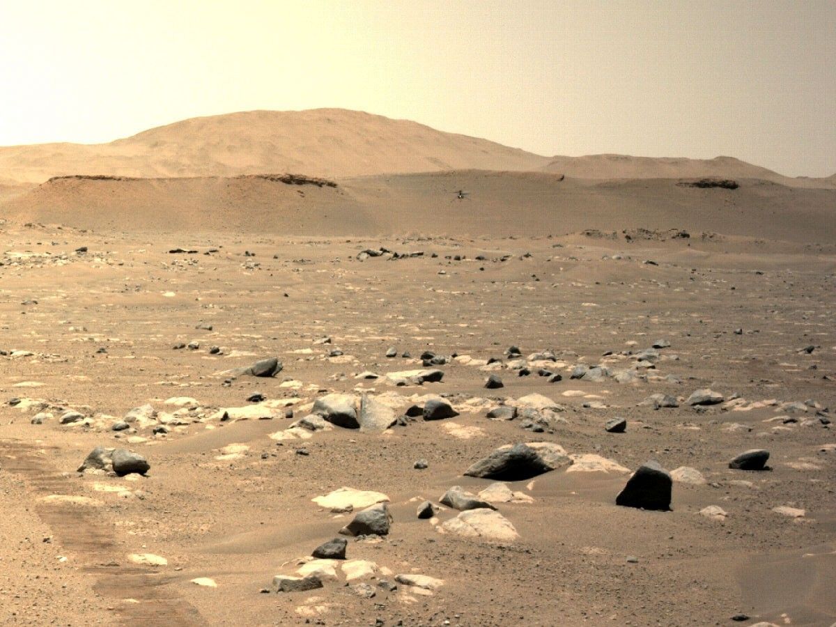 NASA’s Ingenuity Mars Helicopter can be seen hovering during its third flight on April 25, 2021, as seen by the left Navigation Camera aboard NASA’s Perseverance Mars rover.