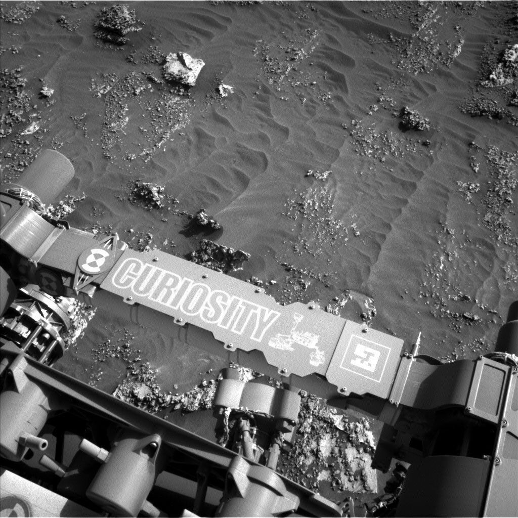 This black and white sandy image was taken by Left Navigation Camera onboard NASA's Mars rover Curiosity on Sol 3158.