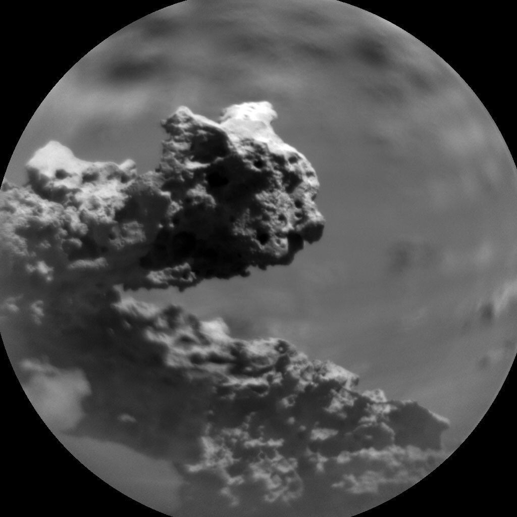 This is a black and white image of clouds taken by the Mars rover Curiosity. The clouds are dark and dense.
