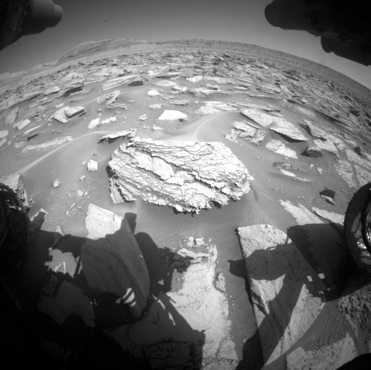 Front Hazcam image of our beautifully-layered workspace for planning sols 3968-3969.