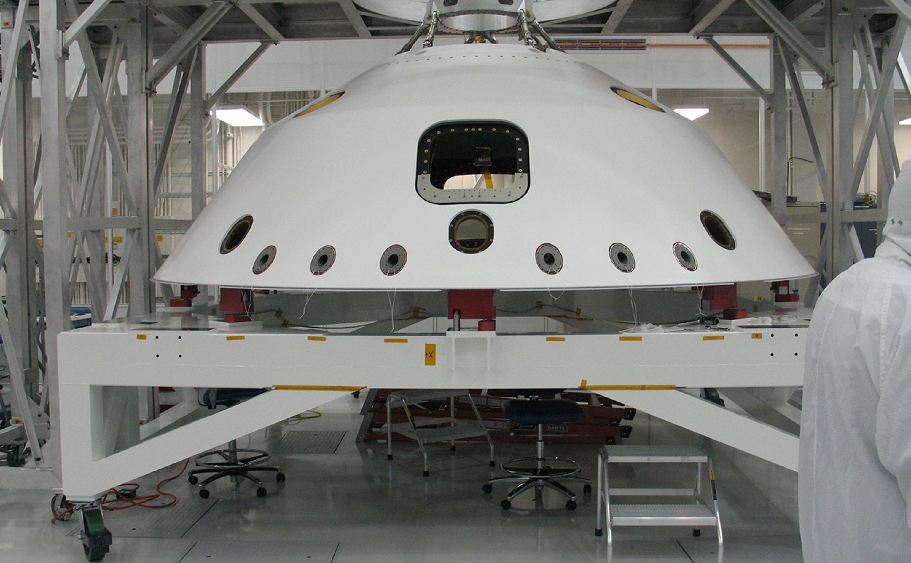 This image shows the heatshield inside a large 'clean room'