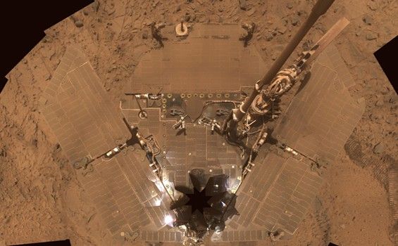 The deck of NASA's Mars Exploration Rover Spirit is so dusty that the rover almost blends into the dusty background in this image assembled from frames taken by the panoramic camera (Pancam) during the period from Spirit's Sol 1,355 through Sol 1,358 (Oct. 26-29, 2007).
