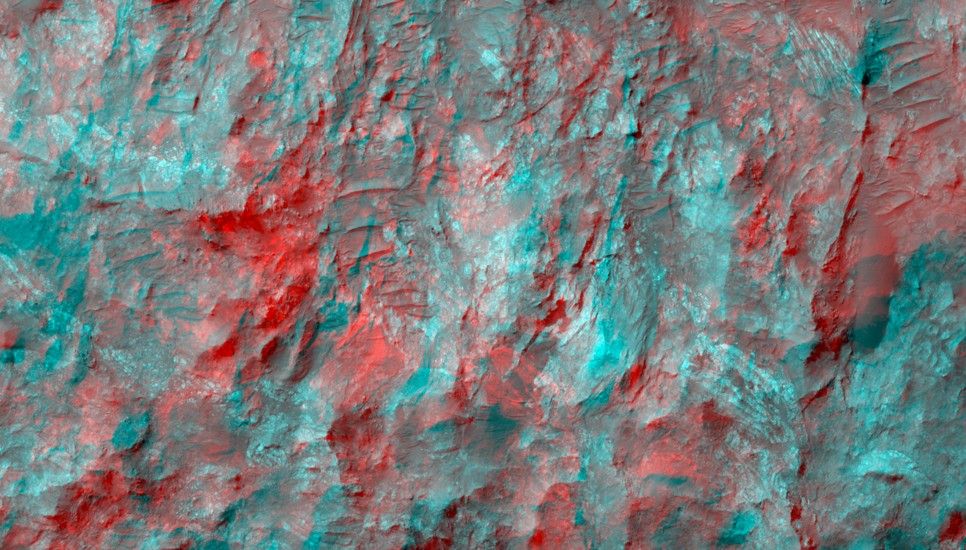 The enhanced-color subimage shows a great variety of colors and textures in the bedrock