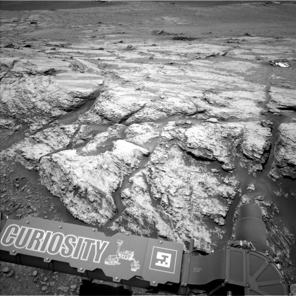 This image was taken by the left Navcam on NASA's Curiosity Mars rover on June 18, 2019, the 2,440th Martian day, or sol, of the mission. It shows part of "Teal Ridge," which the rover has been studying within a region called the "clay-bearing unit."