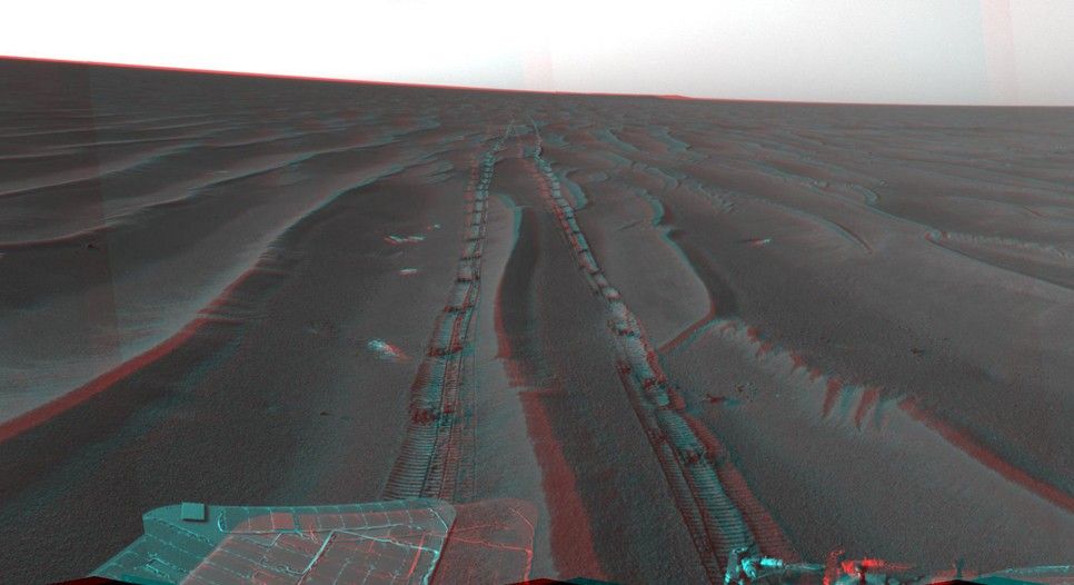 NASA's Mars Exploration Rover Opportunity set a one-day distance record for martian driving on the rover's 383rd martian day, or sol, which began on Feb. 19, 2005