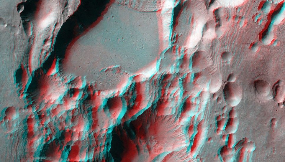 These collapse pits probably formed when lava erupted from the side of Arsia Mons, draining underground magma reservoirs. The resulting voids collapse due to the weight of the solid lava above them.