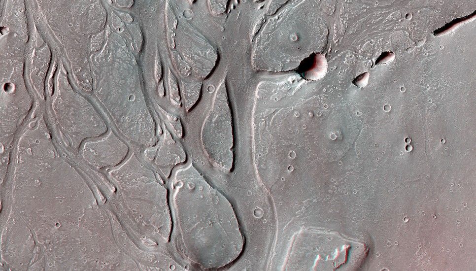 This large outflow channel shows many characteristic signs that massive amounts of water have flowed through this area, including the teardrop and streamlined islands.