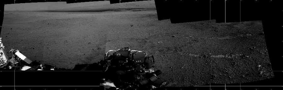 NASA's Mars rover Curiosity took 6 images in Gale Crater using its mast-mounted Left Navigation Camera (Navcam) to create this mosaic. The seam-corrected mosaic provides a 188-degree cylindrical projection panorama of the Martian surface centered at 144 degrees azimuth (measured clockwise from north). Curiosity took the images on August 28, 2012, Sol 21 of the Mars Science Laboratory mission at drive 100, site number 3. The local mean solar time for the image exposures was 3 PM. Each Navcam image has a 45 degree field of view. CREDIT: NASA/JPL-Caltech