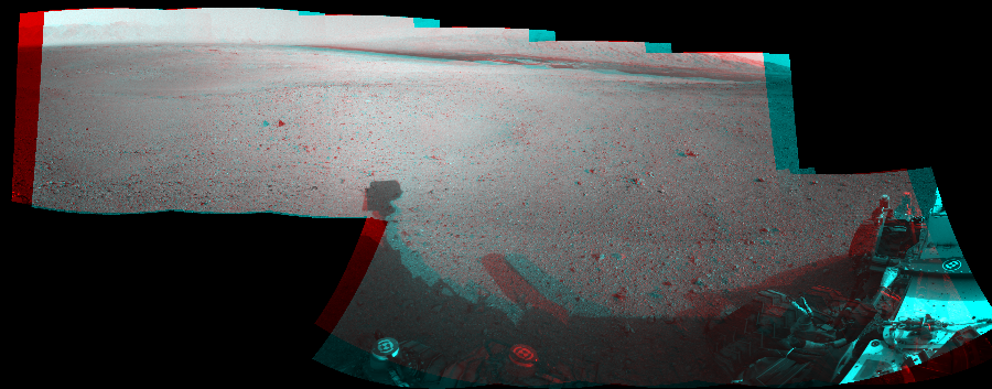 NASA's Mars rover Curiosity took 10 image pairs in Gale Crater using its mast-mounted Navigation Camera (Navcam) to create this mosaic. The seam-corrected mosaic provides a 254-degree cylindrical perspective projection panorama of the Martian surface suitable for stereo viewing, centered at 67 degrees azimuth (measured clockwise from north). This anaglyph must be viewed with red/blue glasses (red over left eye).  Curiosity took the images on August 29, 2012, Sol 22 of the Mars Science Laboratory mission at drive 260, site number 3. The local mean solar time for the image exposures was 3 PM. Each Navcam image has a 45-degree field of view. CREDIT: NASA/JPL-Caltech