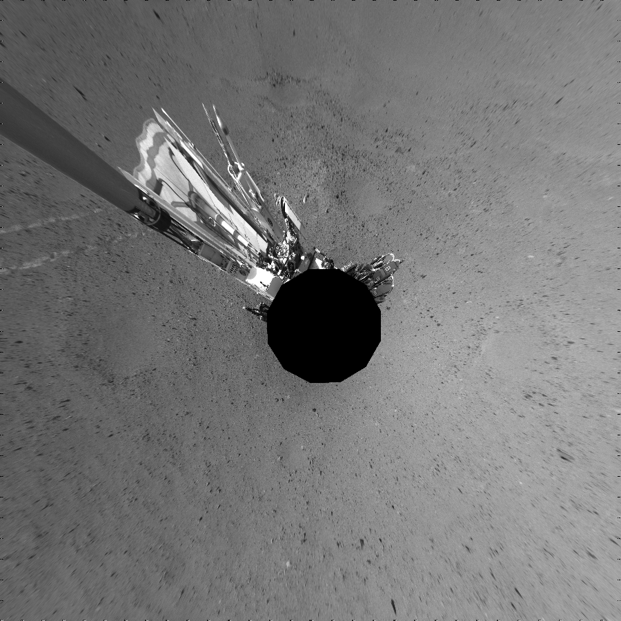 NASA's Mars rover Curiosity took 12 images in Gale Crater using its mast-mounted Left Navigation Camera (Navcam) to create this mosaic. The seam-corrected mosaic provides a vertical projection of the Martian surface near the rover, covering an area of 30 meters (north/south) by 30 meters (east/west). North is up in the image. This projection provides an overhead view, but introduces distortion for items not on the surface, such as large rocks and the rover itself.  Curiosity took the images on August 31, 2012, Sol 24 of the Mars Science Laboratory mission at drive 372, site number 3. The local mean solar time for the image exposures was 2 PM. Each Navcam image has a 45-degree field of view. CREDIT: NASA/JPL-Caltech