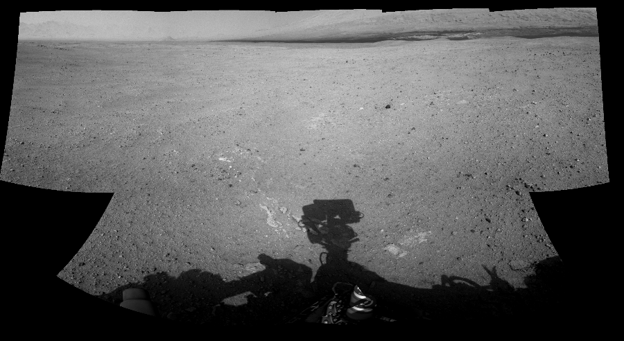 NASA's Mars rover Curiosity took 8 images in Gale Crater using its mast-mounted Left Navigation Camera (Navcam) to create this mosaic. The seam-corrected mosaic provides a 174-degree cylindrical-perspective projection panorama of the Martian surface suitable for stereo viewing, centered at 55 degrees azimuth (measured clockwise from north). This single-eye view must be combined with the partner right image to be viewed in stereo.  Curiosity took the images on September 02, 2012, Sol 26 of the Mars Science Laboratory mission at drive 530, site number 3. The local mean solar time for the image exposures was 2 PM. Each Navcam image has a 45-degree field of view. CREDIT: NASA/JPL-Caltech