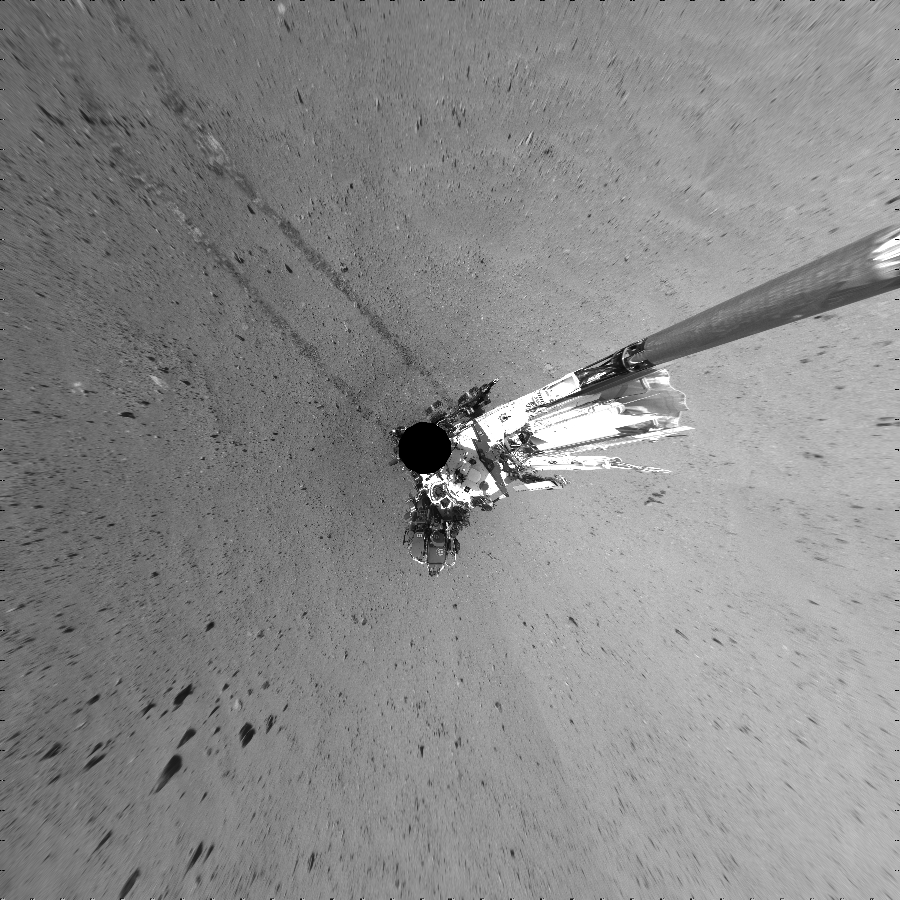 NASA's Mars rover Curiosity took 24 images in Gale Crater using its mast-mounted Left Navigation Camera (Navcam) to create this mosaic. The seam-corrected mosaic provides a vertical projection of the Martian surface near the rover, covering an area of 30 meters (north/south) by 30 meters (east/west). North is up in the image. This projection provides an overhead view, but introduces distortion for items not on the surface, such as large rocks and the rover itself.  Curiosity took the images on September 05, 2012, Sol 29 of the Mars Science Laboratory mission at drive 0, site number 4. The local mean solar time for the image exposures was 2 PM. Each Navcam image has a 45-degree field of view. CREDIT: NASA/JPL-Caltech