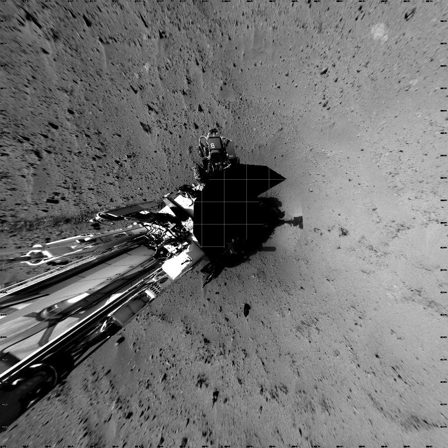 NASA's Mars rover Curiosity took 17 images in Gale Crater using its mast-mounted Left Navigation Camera (Navcam) to create this mosaic. The seam-corrected mosaic provides a vertical projection of the Martian surface near the rover, covering an area of 20 meters (north/south) by 20 meters (east/west). North is up in the image. This projection provides an overhead view, but introduces distortion for items not on the surface, such as large rocks and the rover itself.  Curiosity took the images on September 27, 2012, Sol 50 of the Mars Science Laboratory mission at drive 2956, site number 4. The local mean solar time for the image exposures was from 2 PM to 3 PM. Each Navcam image has a 45-degree field of view. CREDIT: NASA/JPL-Caltech