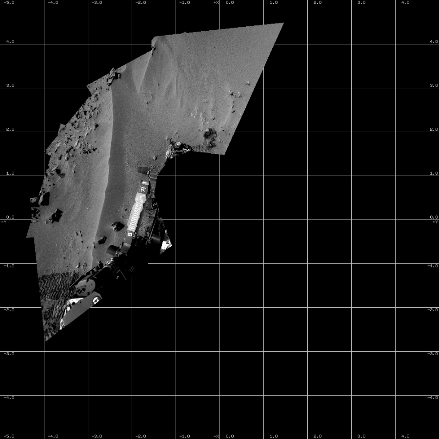 NASA's Mars rover Curiosity took 5 images in Gale Crater using its mast-mounted Left Navigation Camera (Navcam) to create this mosaic. The seam-corrected mosaic provides a vertical projection of the Martian surface near the rover, covering an area of 10 meters (north/south) by 10 meters (east/west). North is up in the image. This projection provides an overhead view, but introduces distortion for items not on the surface, such as large rocks and the rover itself.  Curiosity took the images on October 03, 2012, Sol 56 of the Mars Science Laboratory mission at drive 3474, site number 4. The local mean solar time for the image exposures was 2 PM. Each Navcam image has a 45-degree field of view. CREDIT: NASA/JPL-Caltech