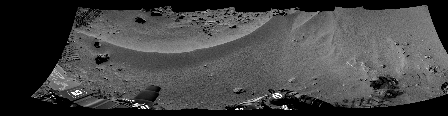 NASA's Mars rover Curiosity took 5 images in Gale Crater using its mast-mounted Right Navigation Camera (Navcam) to create this mosaic. The seam-corrected mosaic provides a 214-degree cylindrical-perspective projection panorama of the Martian surface suitable for stereo viewing, centered at 13 degrees azimuth (measured clockwise from north). This single-eye view must be combined with the partner left image to be viewed in stereo.  Curiosity took the images on October 03, 2012, Sol 56 of the Mars Science Laboratory mission at drive 3474, site number 4. The local mean solar time for the image exposures was 2 PM. Each Navcam image has a 45-degree field of view. CREDIT: NASA/JPL-Caltech