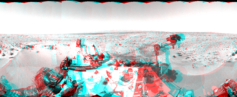 NASA's Mars rover Curiosity took 36 image pairs in Gale Crater using its mast-mounted Navigation Camera (Navcam) to create this mosaic. The seam-corrected mosaic provides a 360-degree cylindrical perspective projection panorama of the Martian surface suitable for stereo viewing, centered at 243 degrees azimuth (measured clockwise from north). This anaglyph must be viewed with red/blue glasses (red over left eye). Curiosity took the images on October 06, 2012, Sols 59-60 of the Mars Science Laboratory mission at drive 104, site number 5. The local mean solar time for the image exposures was from 2 PM to 12 PM. Each Navcam image has a 45-degree field of view. CREDIT: NASA/JPL-Caltech