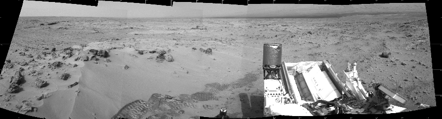 NASA's Mars rover Curiosity took 5 images in Gale Crater using its mast-mounted Left Navigation Camera (Navcam) to create this mosaic. The seam-corrected mosaic provides a 173-degree cylindrical projection panorama of the Martian surface centered at 80 degrees azimuth (measured clockwise from north). Curiosity took the images on November 17, 2012, Sol 100 of the Mars Science Laboratory mission at drive 178, site number 5. The local mean solar time for the image exposures was 3 PM. Each Navcam image has a 45 degree field of view. CREDIT: NASA/JPL-Caltech