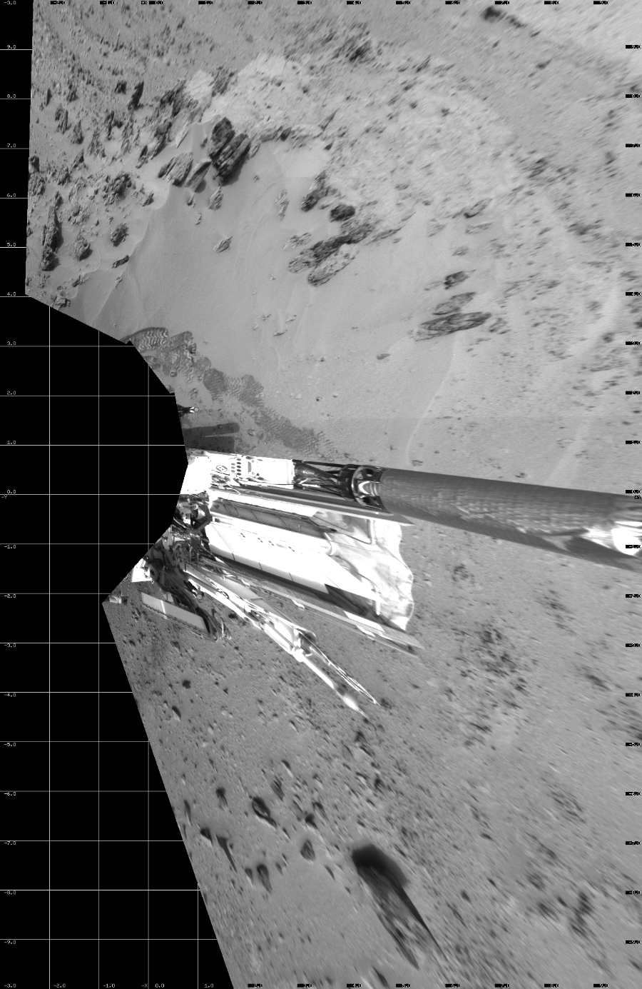 NASA's Mars rover Curiosity took 5 images in Gale Crater using its mast-mounted Left Navigation Camera (Navcam) to create this mosaic. The seam-corrected mosaic provides a vertical projection of the Martian surface near the rover, covering an area of 13 meters (north/south) by 20 meters (east/west). North is up in the image. This projection provides an overhead view, but introduces distortion for items not on the surface, such as large rocks and the rover itself. Curiosity took the images on November 17, 2012, Sol 100 of the Mars Science Laboratory mission at drive 178, site number 5. The local mean solar time for the image exposures was 3 PM. Each Navcam image has a 45-degree field of view. CREDIT: NASA/JPL-Caltech