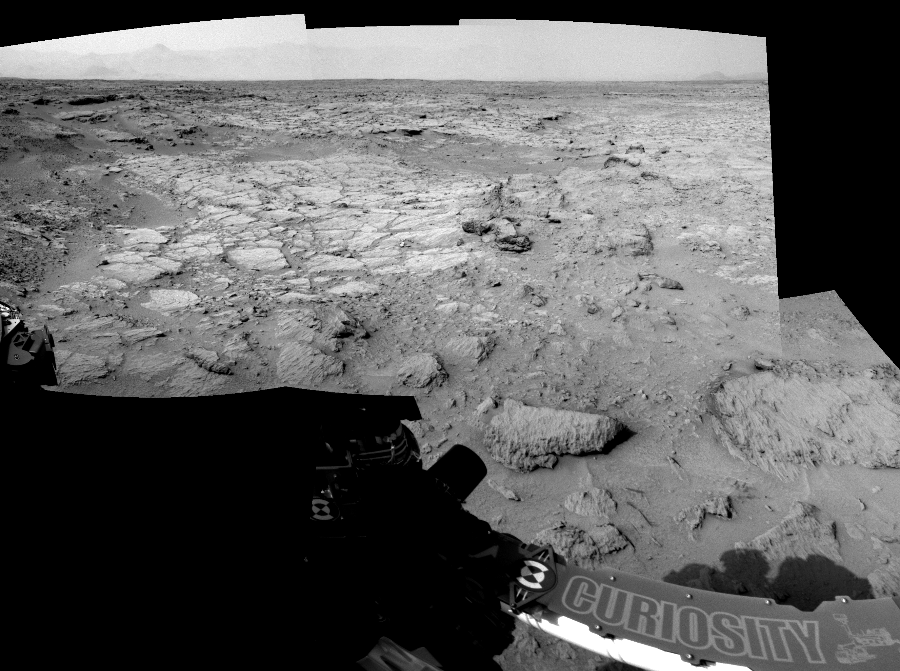 NASA's Mars rover Curiosity took 5 images in Gale Crater using its mast-mounted Left Navigation Camera (Navcam) to create this mosaic. The seam-corrected mosaic provides a 121-degree cylindrical-perspective projection panorama of the Martian surface suitable for stereo viewing, centered at 8 degrees azimuth (measured clockwise from north). This single-eye view must be combined with the partner right image to be viewed in stereo. Curiosity took the images on November 28, 2012, Sol 111 of the Mars Science Laboratory mission at drive 406, site number 5. The local mean solar time for the image exposures was 2 PM. Each Navcam image has a 45-degree field of view. CREDIT: NASA/JPL-Caltech