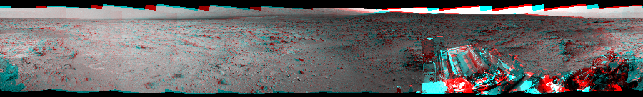 NASA's Mars rover Curiosity took 12 image pairs in Gale Crater using its mast-mounted Navigation Camera (Navcam) to create this mosaic. The seam-corrected mosaic provides a 360-degree cylindrical perspective projection panorama of the Martian surface suitable for stereo viewing, centered at 124 degrees azimuth (measured clockwise from north). This anaglyph must be viewed with red/blue glasses (red over left eye). Curiosity took the images on December 05, 2012, Sol 118 of the Mars Science Laboratory mission at drive 432, site number 5. The local mean solar time for the image exposures was 2 PM. Each Navcam image has a 45-degree field of view. CREDIT: NASA/JPL-Caltech