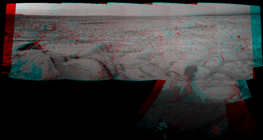 NASA's Mars rover Curiosity took 6 image pairs in Gale Crater using its mast-mounted Navigation Camera (Navcam) to create this mosaic. The seam-corrected mosaic provides a 175-degree cylindrical perspective projection panorama of the Martian surface suitable for stereo viewing, centered at 13 degrees azimuth (measured clockwise from north). This anaglyph must be viewed with red/blue glasses (red over left eye).  Curiosity took the images on December 09, 2012, Sol 121 of the Mars Science Laboratory mission at drive 926, site number 5. The local mean solar time for the image exposures was 3 PM. Each Navcam image has a 45-degree field of view. CREDIT: NASA/JPL-Caltech
