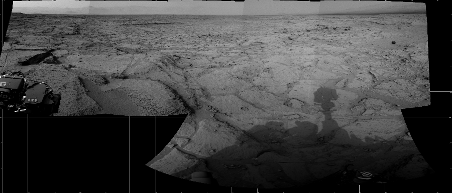 NASA's Mars rover Curiosity took 7 images in Gale Crater using its mast-mounted Left Navigation Camera (Navcam) to create this mosaic. The seam-corrected mosaic provides a 177-degree cylindrical projection panorama of the Martian surface centered at 38 degrees azimuth (measured clockwise from north). Curiosity took the images on December 09, 2012, Sol 121 of the Mars Science Laboratory mission at drive 926, site number 5. The local mean solar time for the image exposures was 3 PM. Each Navcam image has a 45 degree field of view. CREDIT: NASA/JPL-Caltech