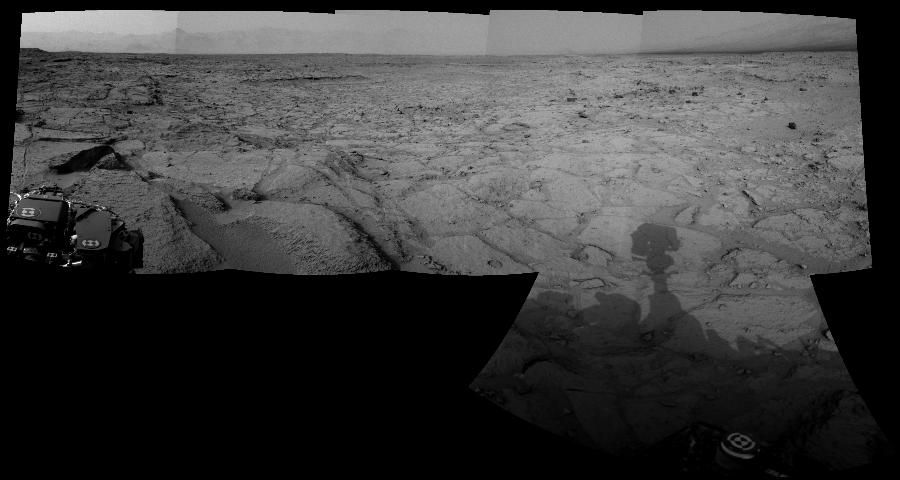NASA's Mars rover Curiosity took 6 images in Gale Crater using its mast-mounted Left Navigation Camera (Navcam) to create this mosaic. The seam-corrected mosaic provides a 175-degree cylindrical-perspective projection panorama of the Martian surface suitable for stereo viewing, centered at 13 degrees azimuth (measured clockwise from north). This single-eye view must be combined with the partner right image to be viewed in stereo.  Curiosity took the images on December 09, 2012, Sol 121 of the Mars Science Laboratory mission at drive 926, site number 5. The local mean solar time for the image exposures was 3 PM. Each Navcam image has a 45-degree field of view. CREDIT: NASA/JPL-Caltech