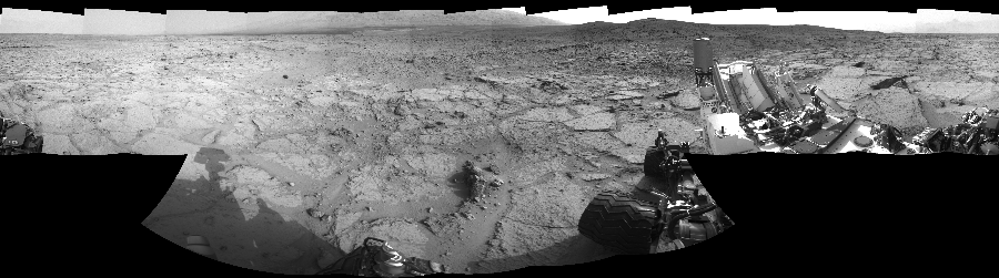 NASA's Mars rover Curiosity took 17 images in Gale Crater using its mast-mounted Left Navigation Camera (Navcam) to create this mosaic. The seam-corrected mosaic provides a 360-degree cylindrical-perspective projection panorama of the Martian surface suitable for stereo viewing, centered at 115 degrees azimuth (measured clockwise from north). This single-eye view must be combined with the partner right image to be viewed in stereo.  Curiosity took the images on December 10, 2012, Sol 122 of the Mars Science Laboratory mission at drive 938, site number 5. The local mean solar time for the image exposures was 3 PM. Each Navcam image has a 45-degree field of view. CREDIT: NASA/JPL-Caltech