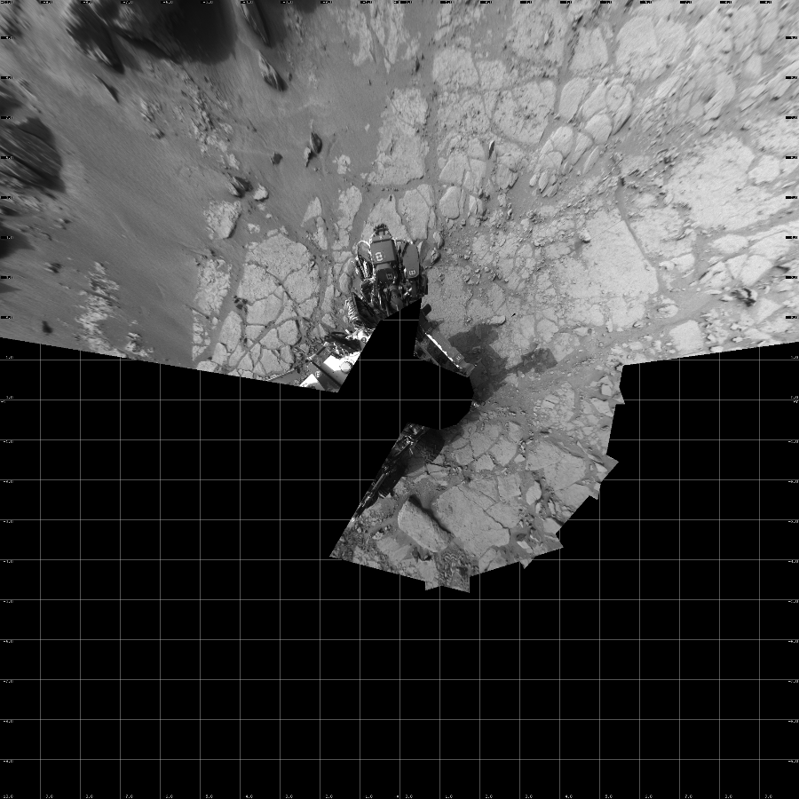 NASA's Mars rover Curiosity took 11 images in Gale Crater using its mast-mounted Left Navigation Camera (Navcam) to create this mosaic. The seam-corrected mosaic provides a vertical projection of the Martian surface near the rover, covering an area of 20 meters (north/south) by 20 meters (east/west). North is up in the image. This projection provides an overhead view, but introduces distortion for items not on the surface, such as large rocks and the rover itself.  Curiosity took the images on December 15, 2012, Sol 127 of the Mars Science Laboratory mission at drive 1576, site number 5. The local mean solar time for the image exposures was 3 PM. Each Navcam image has a 45-degree field of view. CREDIT: NASA/JPL-Caltech