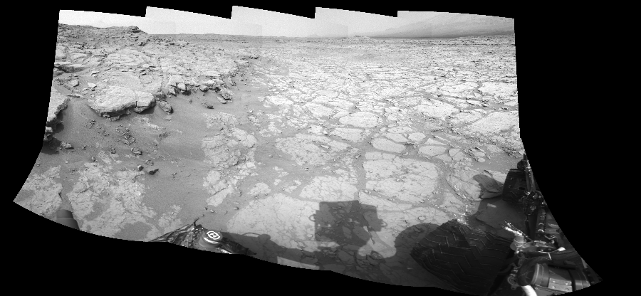 NASA's Mars rover Curiosity took 10 images in Gale Crater using its mast-mounted Left Navigation Camera (Navcam) to create this mosaic. The seam-corrected mosaic provides a 227-degree cylindrical-perspective projection panorama of the Martian surface suitable for stereo viewing, centered at 99 degrees azimuth (measured clockwise from north). This single-eye view must be combined with the partner right image to be viewed in stereo.  Curiosity took the images on December 18, 2012, Sol 130 of the Mars Science Laboratory mission at drive 1662, site number 5. The local mean solar time for the image exposures was from 1 PM to 2 PM. Each Navcam image has a 45-degree field of view. CREDIT: NASA/JPL-Caltech