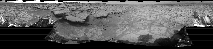 NASA's Mars rover Curiosity took 18 images in Gale Crater using its mast-mounted Left Navigation Camera (Navcam) to create this mosaic. The seam-corrected mosaic provides a 360-degree cylindrical projection panorama of the Martian surface centered at 0 degrees azimuth (measured clockwise from north). Curiosity took the images on December 19, 2012, Sol 131 of the Mars Science Laboratory mission at drive 1662, site number 5. The local mean solar time for the image exposures was 3 PM. Each Navcam image has a 45 degree field of view. CREDIT: NASA/JPL-Caltech