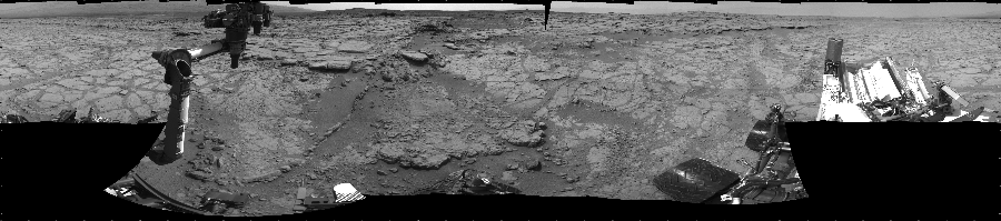 NASA's Mars rover Curiosity took 18 images in Gale Crater using its mast-mounted Left Navigation Camera (Navcam) to create this mosaic. The seam-corrected mosaic provides a 360-degree cylindrical projection panorama of the Martian surface centered at 270 degrees azimuth (measured clockwise from north). Curiosity took the images on January 04, 2013, Sol 147 of the Mars Science Laboratory mission at drive 1902, site number 5. The local mean solar time for the image exposures was from 1 PM to 2 PM. Each Navcam image has a 45 degree field of view. CREDIT: NASA/JPL-Caltech