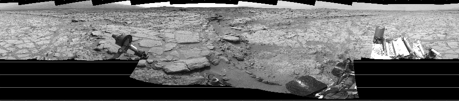 NASA's Mars rover Curiosity took 17 images in Gale Crater using its mast-mounted Left Navigation Camera (Navcam) to create this mosaic. The seam-corrected mosaic provides a 360-degree cylindrical projection panorama of the Martian surface centered at 270 degrees azimuth (measured clockwise from north). Curiosity took the images on January 09, 2013, Sol 152 of the Mars Science Laboratory mission at drive 1954, site number 5. The local mean solar time for the image exposures was 1 PM. Each Navcam image has a 45 degree field of view. CREDIT: NASA/JPL-Caltech