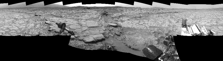 NASA's Mars rover Curiosity took 17 images in Gale Crater using its mast-mounted Left Navigation Camera (Navcam) to create this mosaic. The seam-corrected mosaic provides a 360-degree cylindrical-perspective projection panorama of the Martian surface suitable for stereo viewing, centered at 70 degrees azimuth (measured clockwise from north). This single-eye view must be combined with the partner right image to be viewed in stereo.  Curiosity took the images on January 09, 2013, Sol 152 of the Mars Science Laboratory mission at drive 1954, site number 5. The local mean solar time for the image exposures was 1 PM. Each Navcam image has a 45-degree field of view. CREDIT: NASA/JPL-Caltech