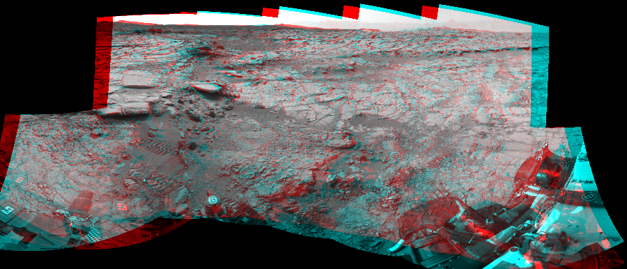 NASA's Mars rover Curiosity took 11 image pairs in Gale Crater using its mast-mounted Navigation Camera (Navcam) to create this mosaic. The seam-corrected mosaic provides a 237-degree cylindrical perspective projection panorama of the Martian surface suitable for stereo viewing, centered at 74 degrees azimuth (measured clockwise from north). This anaglyph must be viewed with red/blue glasses (red over left eye).  Curiosity took the images on January 17, 2013, Sol 159 of the Mars Science Laboratory mission at drive 1986, site number 5. The local mean solar time for the image exposures was 2 PM. Each Navcam image has a 45-degree field of view. CREDIT: NASA/JPL-Caltech